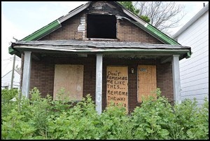 The city will apply for a state grant to demolish blighted buildings, but there are a lot of strings attached to winning it.
