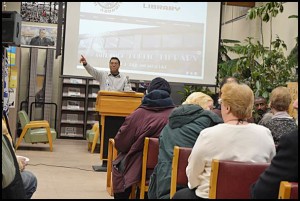 Ron Orr of the Hamtramck Community Initiative talks about current projects in the city at last week’s Town Hall meeting, held in the public library.
