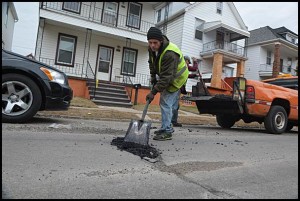 Don’t expect anything more than cold patching for city streets. Anything more permanent will have to wait until a city manager is hired.