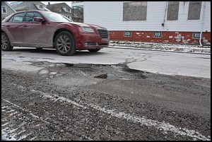 Watch out drivers. Although winter is not even a month old, there are many potholes popping up in the city. The city is aware of the problem and is assigning workers to fill them.