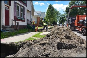 DTE work crews are still replacing gas lines in the neighborhoods, which results in parking inconveniences and for some, the tearing up of sidewalk slabs. DTE is replacing the sidewalks.