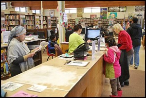 Hamtramck’s Public Library has to reduce its costs in order to avoid eating up its budget surplus.