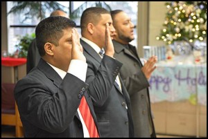 City Councilmembers Abu Musa, Saad Almasmari and Anam Miah take the oath of office at Sunday’s swearing-in ceremony at the library.