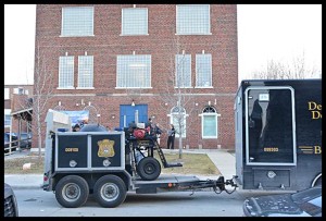 The Detroit Police Department's bomb squad was called to remove two hand grenades that an elderly woman brought into the police station.